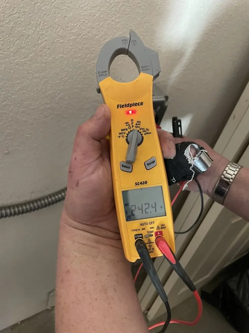 Voltage testing with clamp meter during Generator Installation in Alafaya